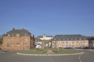 Former royal Bavarian rent office built in 1902 and baroque town hall built in 1775 with view of