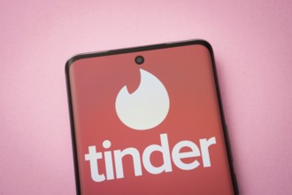 Dhaka, Bangladesh - 18 March 2025: The logo of the tinder is displayed on a smartphone screen