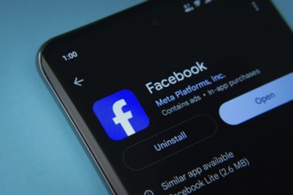 The Facebook app from Google Playstore is displayed on a smartphone screen