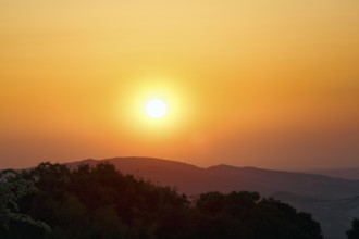 Sunset over mountain range, Sierras Subbeticas Natural Park, near Zuheros, Cordoba province,
