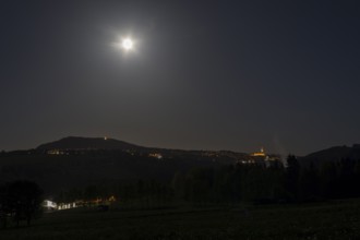 View from north to Pöhlberg and Annaberg-Buchholz with St.-Annen church, full moon night,