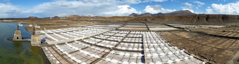 Salt mining plant, Salinas de Janubio with green Laguna de Janubio, near Yaiza, aerial view,