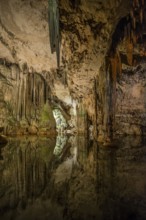 Huge stalactites and underground lake, stalactite cave Grotta di Nettuno, Neptune Grotto, Capo