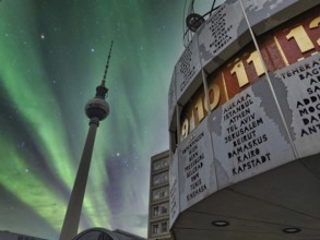 Fascinating polar lights, edited, above the Berlin World Clock and the Berlin TV Tower at night,