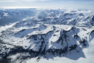 Snow and ice, epic mountains with glaciers, aerial view, Alaska Range, Denali National Park,