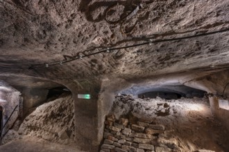 Remaining rubble from World War II in the historic rock cellars, laid out in the 17th century,