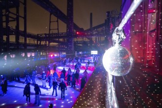 Ice rink at the Zollverein coking plant, ice skating with music and many lighting effects, Essen,