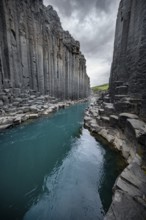 Stuðlagil Canyon, turquoise river between basalt columns, Egilsstadir, Iceland