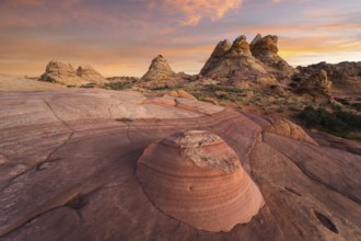Golden sunset lighting the unique rock formations of Coyote Buttes in the Paria Canyon-Vermilion