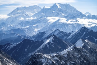 Clouds over high mountains, Mt Foraker and Mt Denali or Mount McKinley, aerial view, Alaska Range,