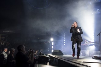 Claudius Dreilich, singer of Karat live on 50 years of KARAT tour in Berlin's Max-Schmeling-Halle