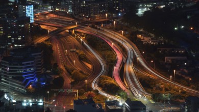 New Zealand, Auckland, parts of the city at night, illuminated roads, skyscrapers, night view, view
