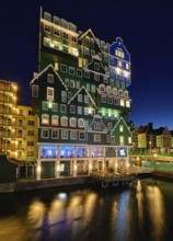 ZAANDAM, NETHERLANDS, MAY 8, 2017: Inntel Hotel in Zaandam illuminated at night. Design of
