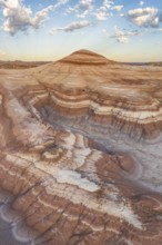 Stunning aerial shot capturing the intricate layers and rolling hills of bentonite clay in Utah's