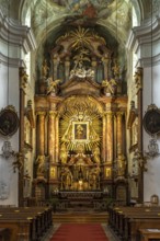 Altar of the baroque parish church Mariahilfer Kirche in Vienna, Austria