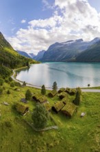 Traditional cabins on the shores of Lake Lovatnet, Breng seter, Loen, Stryn, Norway