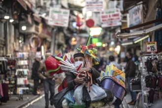 Istanbul, Turkey. November 28th 2020 A man selling household wares in the streets of Istanbul.