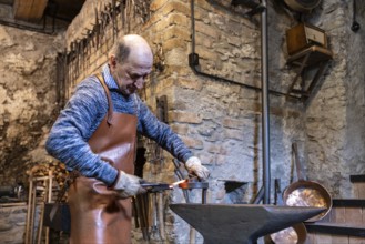 An elderly blacksmith in Austria's Salzburg region maintains the centuries-old traditions of his