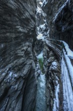 Winter, snowy landscape, river Breitach and hiking trail through the Breitachklamm gorge near
