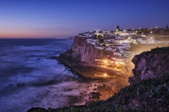 Scenic view of the seaside Azenhas do Mar fishing village on cliff on Atlantic ocean coast,