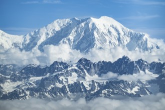 Clouds over high mountains, Mt Foraker, aerial view, Alaska Range, Denali National Park, Alaska,