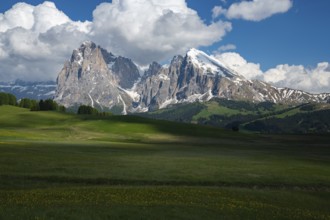 Alpe di Siusi in the Dolomites mountains of Italy offers a stunning landscape. Verdant meadows