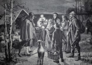 Christmas scene in the Rauhen Alb, Swabian Jura, the family bringing a small Christmas tree and
