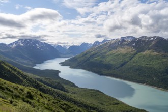 View of blue lake and mountains on Twin Peaks Trail, Eklutna Lake, Chugach Mountains, Chugach State