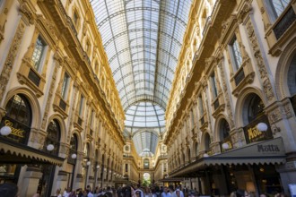 View of the Galleria Vittorio Emanuele with its many luxury shops in Milan on a sunny day, Milan,