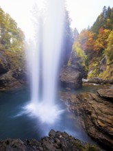 Waterfall mountain list in autumn-colored surroundings, Linthal, Klausenpass, Canton of Glarus,