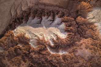 A striking aerial shot of the distinctive geological formations in Goblin Valley State Park, Utah,