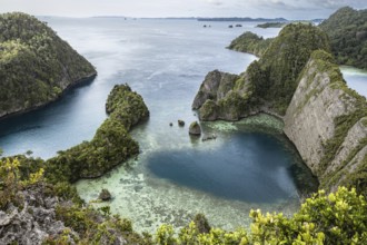 From above, this drone-captured image showcases the breathtaking Raja Ampat Archipelago in