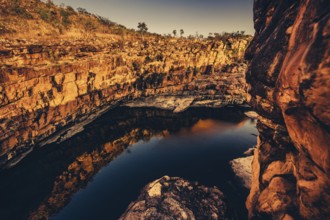 Bell Gorge waterfall, a body of water in north-west Australia in the Kimberley. Sunrise in the