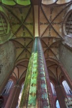 Fabulously painted pillars and vaults in St Nicholas' Church, late Gothic brick building, built
