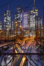 Railway tracks in front of the main railway station in Frankfurt am Main, skyline of skyscrapers in