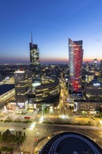Skyline skyscrapers in the city centre at night in Warsaw, Poland