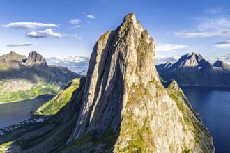 Aerial view of Mt. Segla, in the back Mt. Breidtinden, Senja Island, Norway
