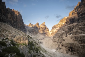 Sunset, mountain valley, Castelletto Superiore and Cima Sella peaks, back Scharte Bocca di Tuckett,