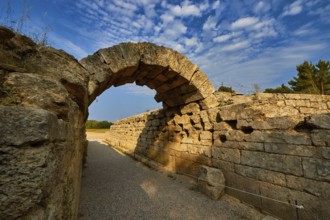 Crypt, vaulted entrance to the stadium, ancient stone arch with distinctive shadows along old walls