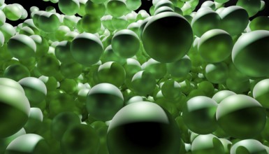 Dynamic and abstract composition of floating green spheres creating a vibrant and energetic scene.