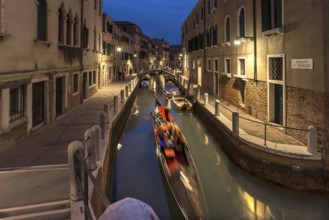 Gondola in the evening in a side canal in the Dorsoduro district, Venice, Veneto, Italy