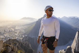 A man confidently practices mountaineering and rappelling at Eagleâ€™s Nest in Monterrey, Mexico,