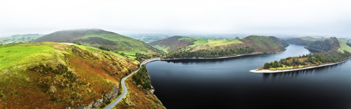 Autumn colours over Llyn Clywedog and Clywedog Reservoir from a drone, Llanidloes, Wales, UK