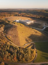 Landscape with factory on a hill in autumnal surroundings, Gechingen, Black Forest, Germany