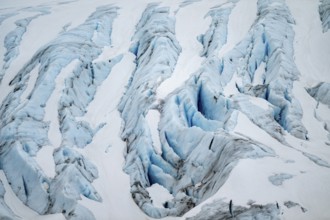 Blue rugged glacier ice with crevasses and snow, detail, Exit Glacier, Kenai Peninsula, Alaska, USA