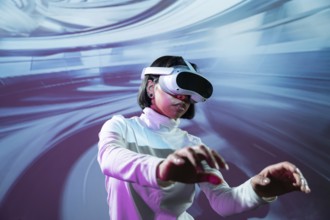A Latin woman wearing virtual reality glasses engages with an immersive digital environment. Her