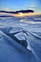 Sunset on ice, Lake Baikal, Olkhon Island, Pribaikalsky National Park, Irkutsk Province, Siberia,