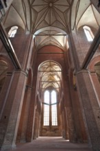 Empty interior of St Georgen, Gothic brick building of the 14th century, under reconstruction,