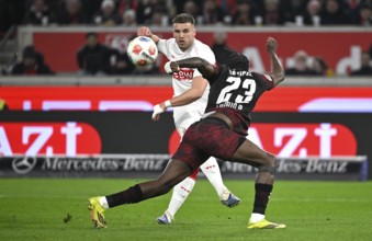 Duel, action Ermedin Demirovic VfB Stuttgart (09) against Castello Lukeba RasenBallsport RB Leipzig