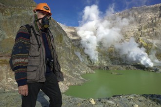 New Zealand, island, White Island, geothermal, gases, volcanism, man wearing respirator, gas mask,